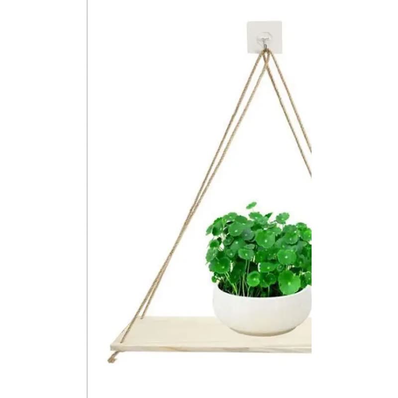 A wooden shelf hanging inside a rope triangle on a white wall, holding a small potted plant (seller photo from the AliExpress listing)