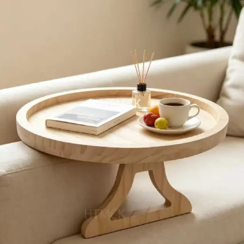 Round natural-wood tray clipped over a sofa arm, holding a cup of coffee, a book, fruit and a reed diffuser (seller photo from the AliExpress listing)